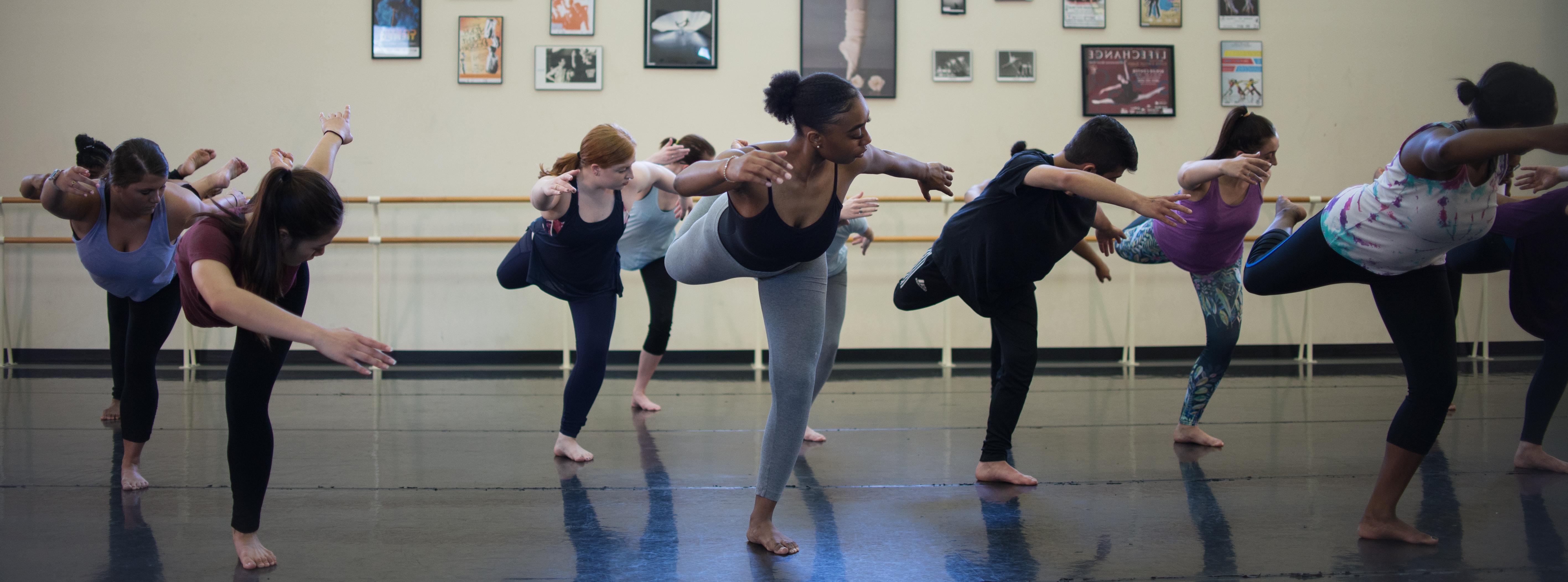 Students in the dance studio practice choreography